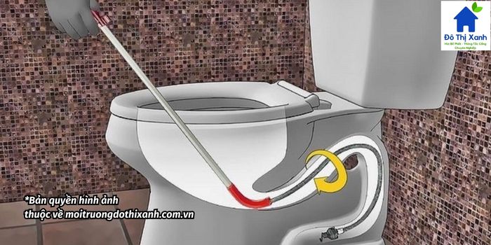 thông bồn cầu bằng dây lò xo